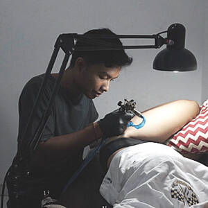 Professional Bali tattoo studio setup with hygiene focus